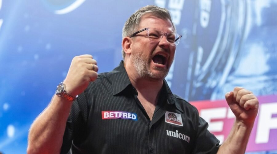 a man James Wade with his fist up