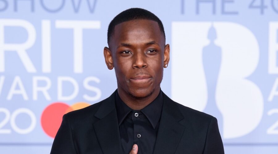 Michael Ward in a black suit